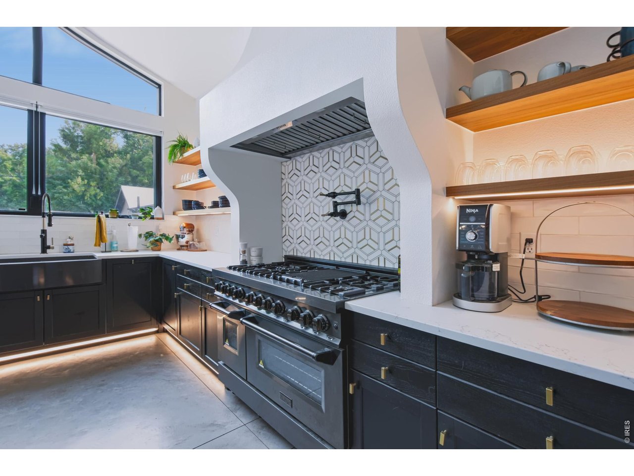 821 Laporte Avenue Fort Collins, CO 80521 - Photo 11 of 33 Professional range plus commercial hood.