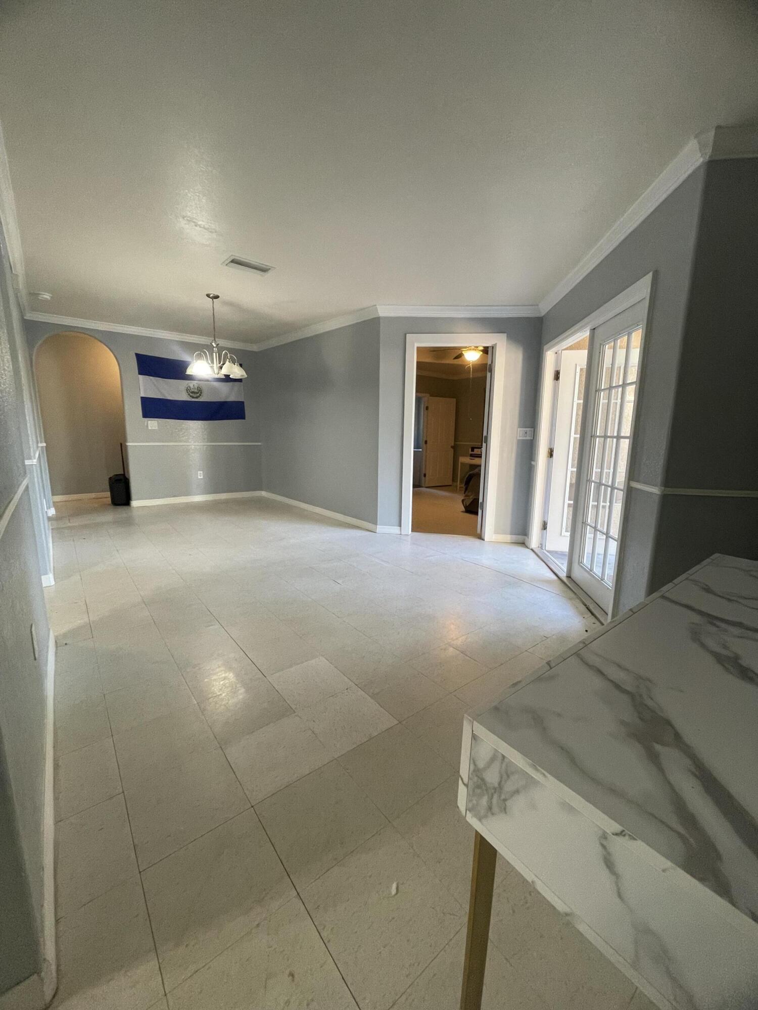 1220 A Road LaBelle, FL 33935 - Photo 27 of 42 a view of a livingroom with furniture and window