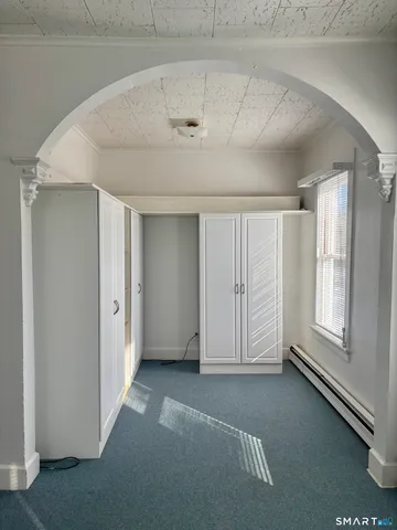 an empty room with windows