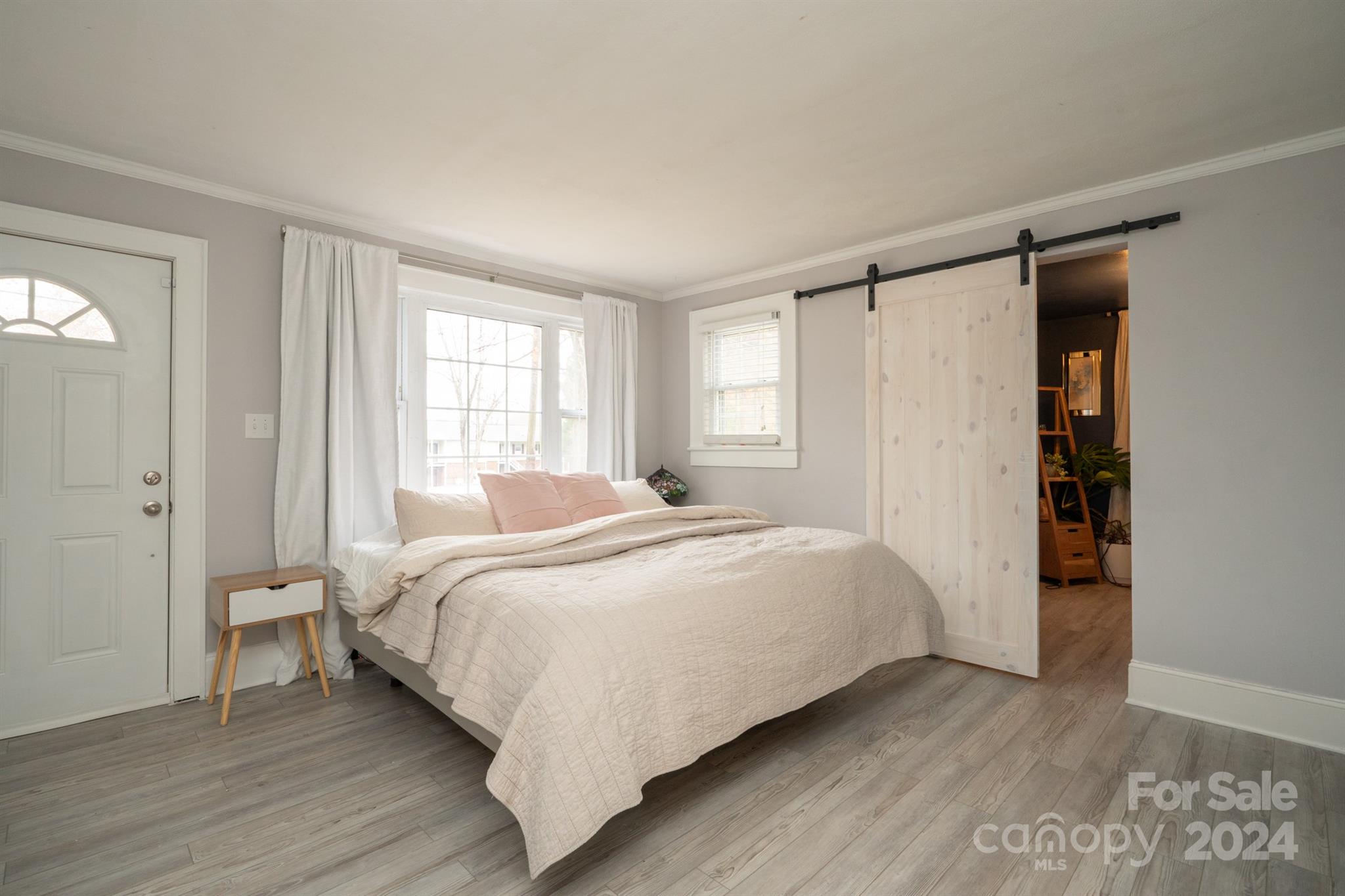 1072 5th Street Northeast Hickory, NC 28601 - Photo 15 of 27 a bedroom with a bed and a window