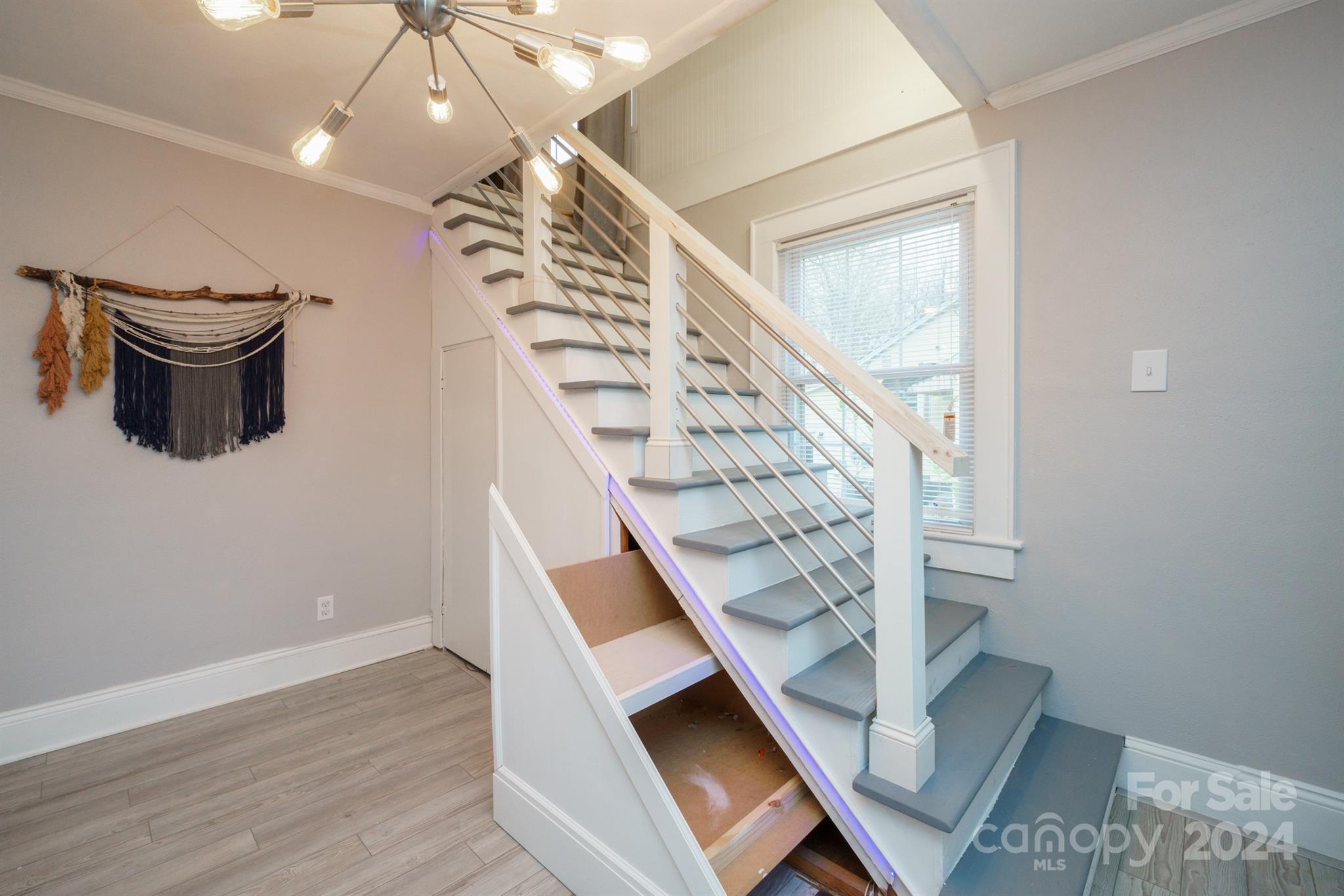 1072 5th Street Northeast Hickory, NC 28601 - Photo 21 of 27 a view of entryway and hall with wooden floor