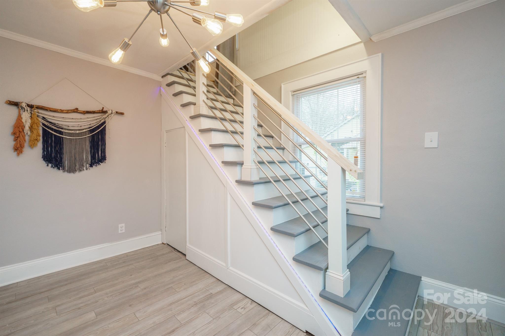 1072 5th Street Northeast Hickory, NC 28601 - Photo 22 of 27 a view of entryway and hall with wooden floor