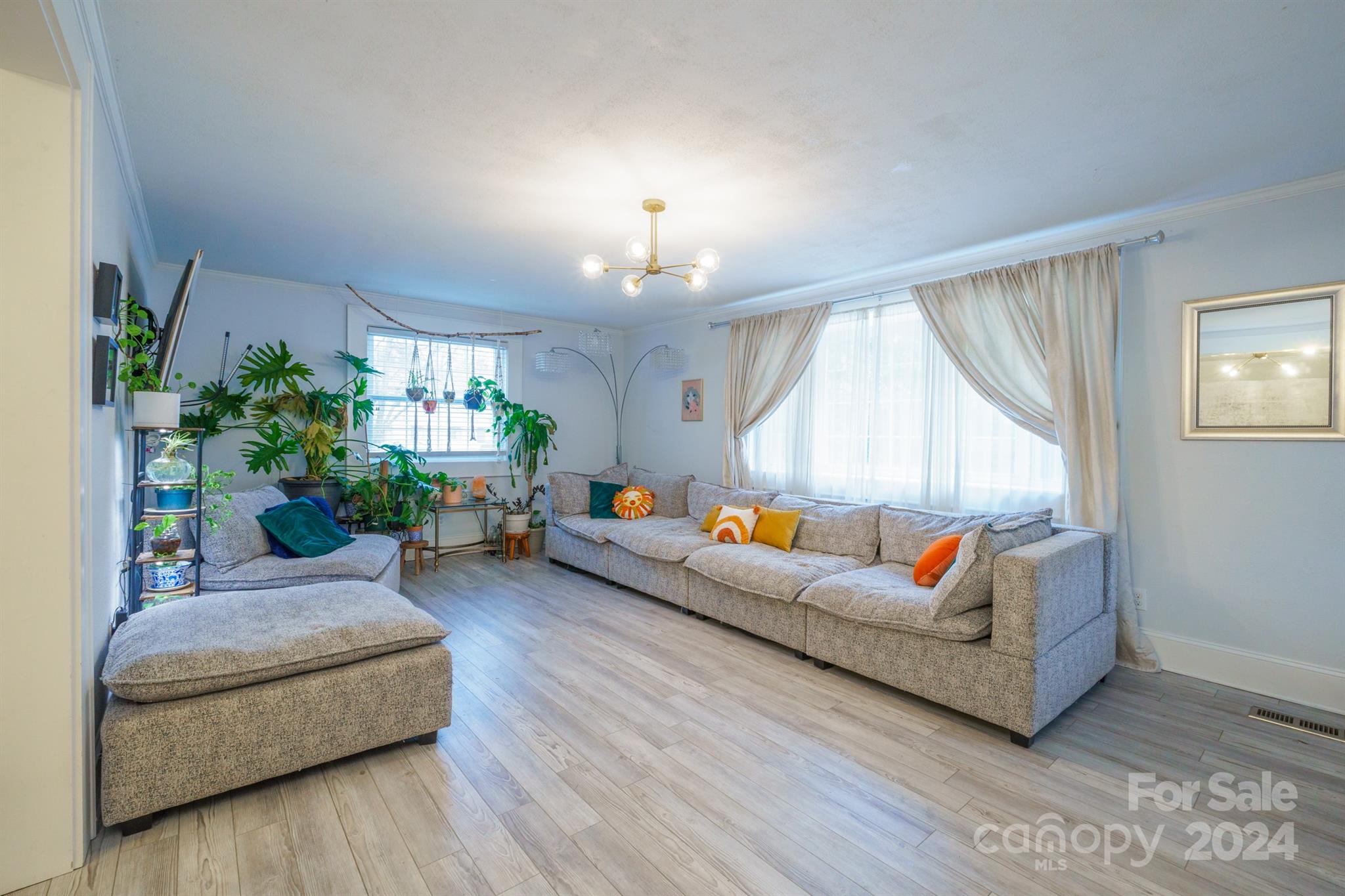 1072 5th Street Northeast Hickory, NC 28601 - Photo 25 of 27 a living room with furniture and a large window