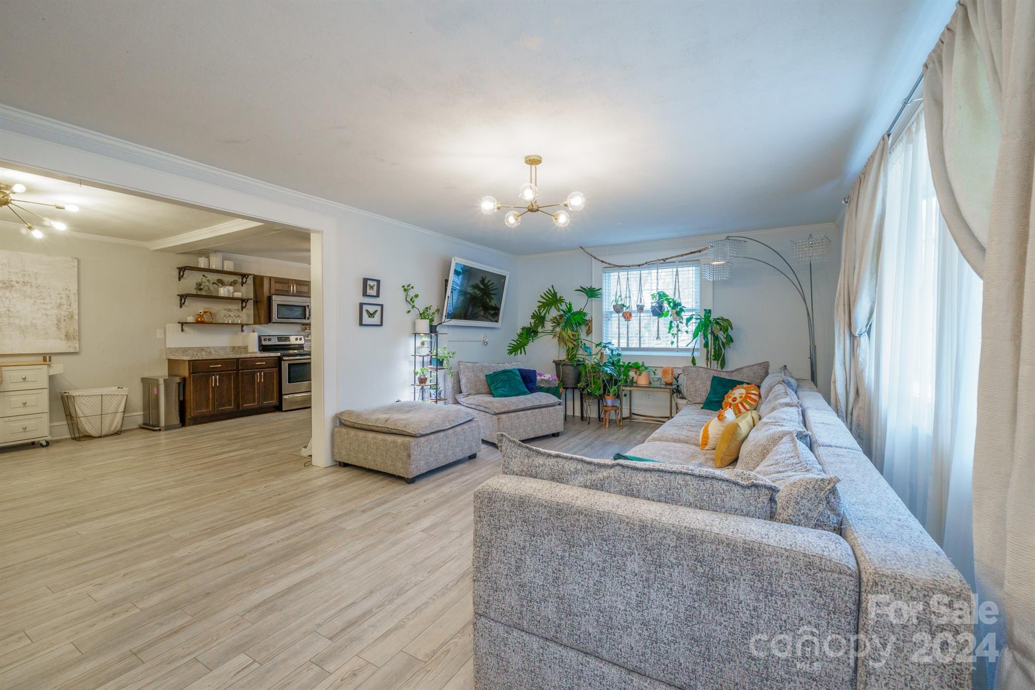 1072 5th Street Northeast Hickory, NC 28601 - Photo 26 of 27 a living room with furniture and wooden floor