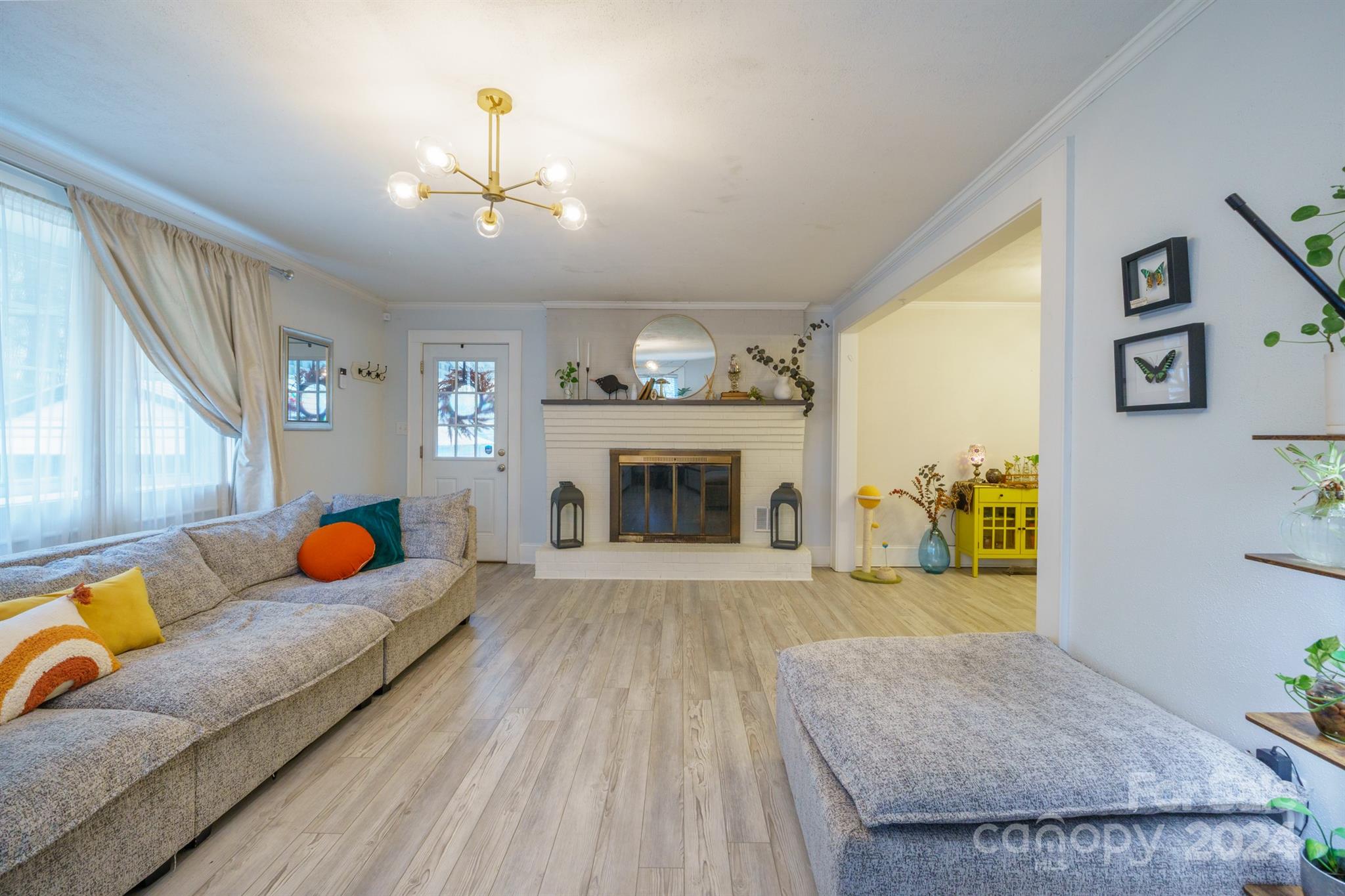 1072 5th Street Northeast Hickory, NC 28601 - Photo 7 of 27 a living room with furniture and a fireplace