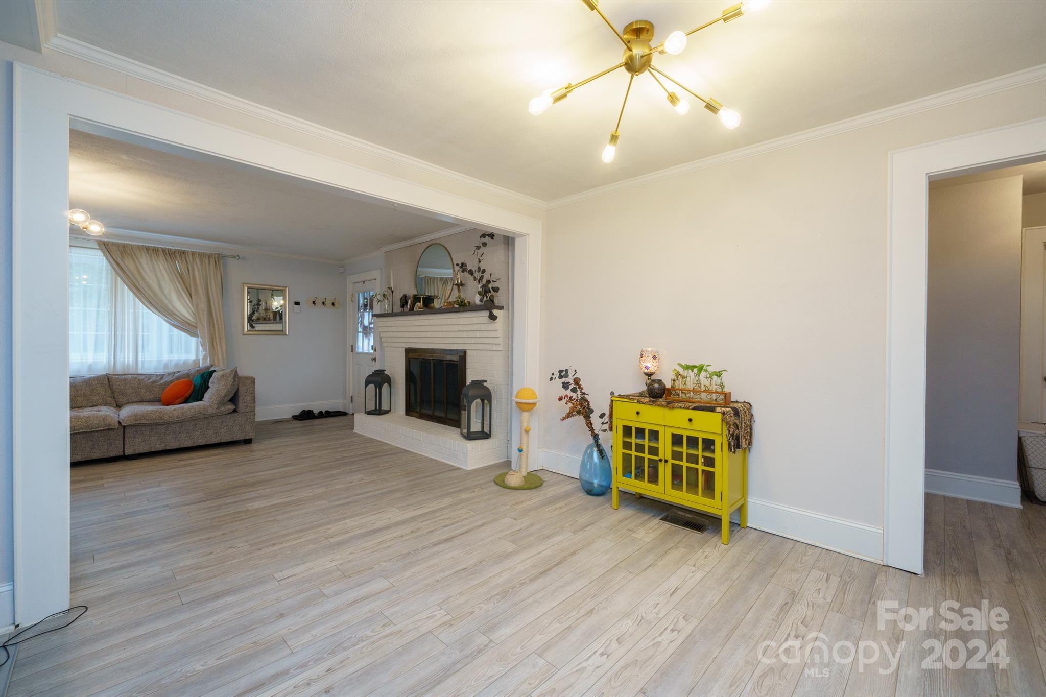 1072 5th Street Northeast Hickory, NC 28601 - Photo 10 of 27 a living room with furniture and a fireplace