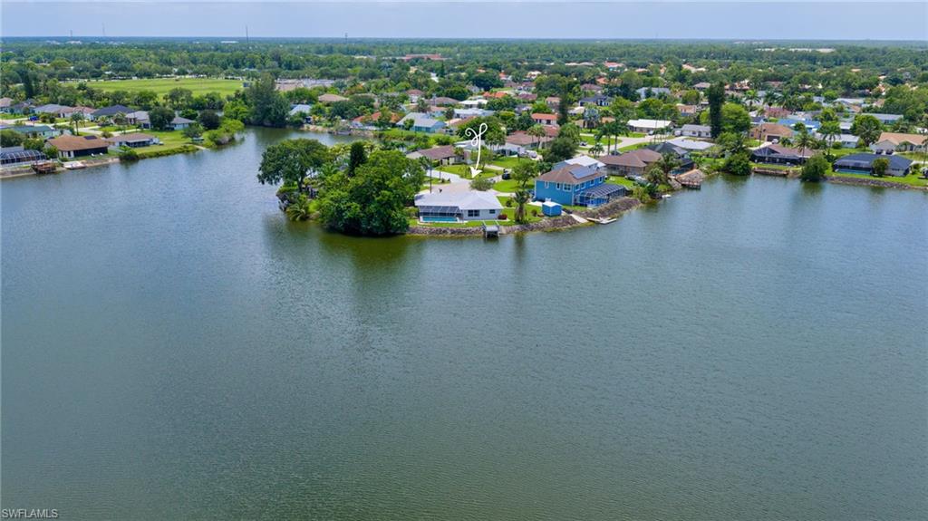 3065 50th Lane Southwest Naples, FL 34116 - Photo 29 of 31 an aerial view of a town with swimming pool and mountains
