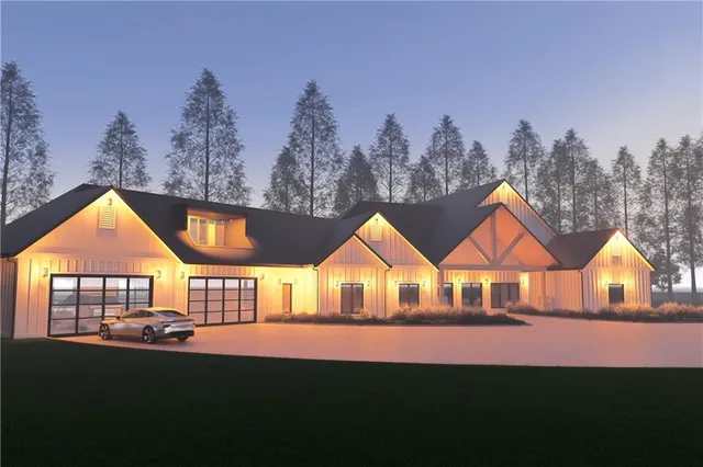 a view of house with outdoor space and sitting area