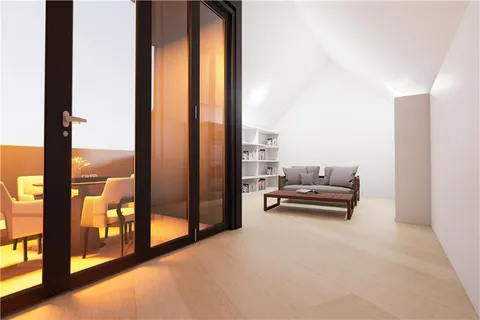 a view of living room with furniture and floor to ceiling window