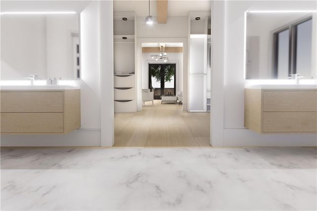 a view of storage and utility room with washer and dryer