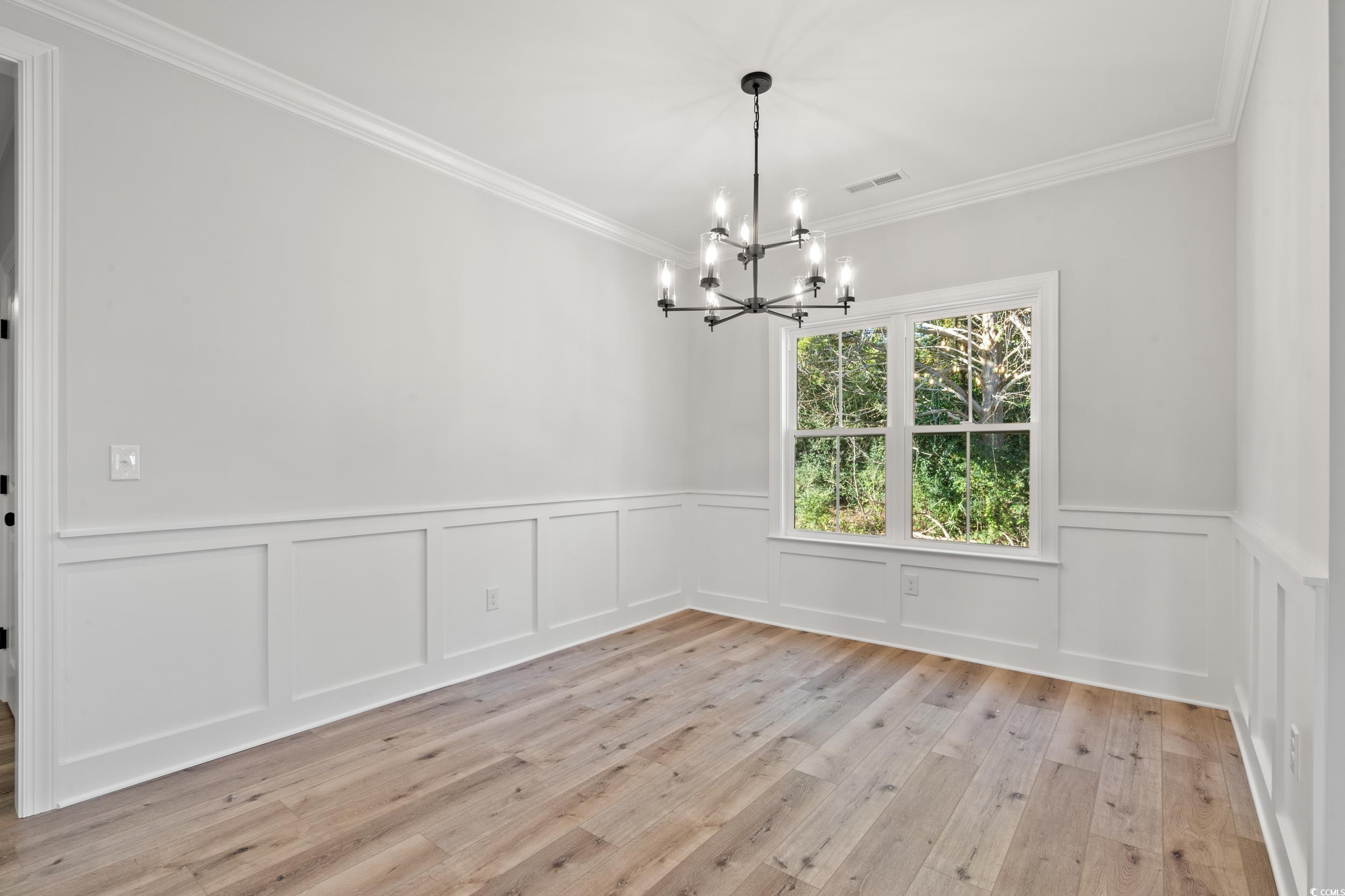 1201 Crooked Hook Road North Myrtle Beach, SC 29582 - Photo 11 of 23 Unfurnished living room featuring light wood-style flooring, plenty of natural light, recessed lighting, high vaulted ceiling, and ceiling fan