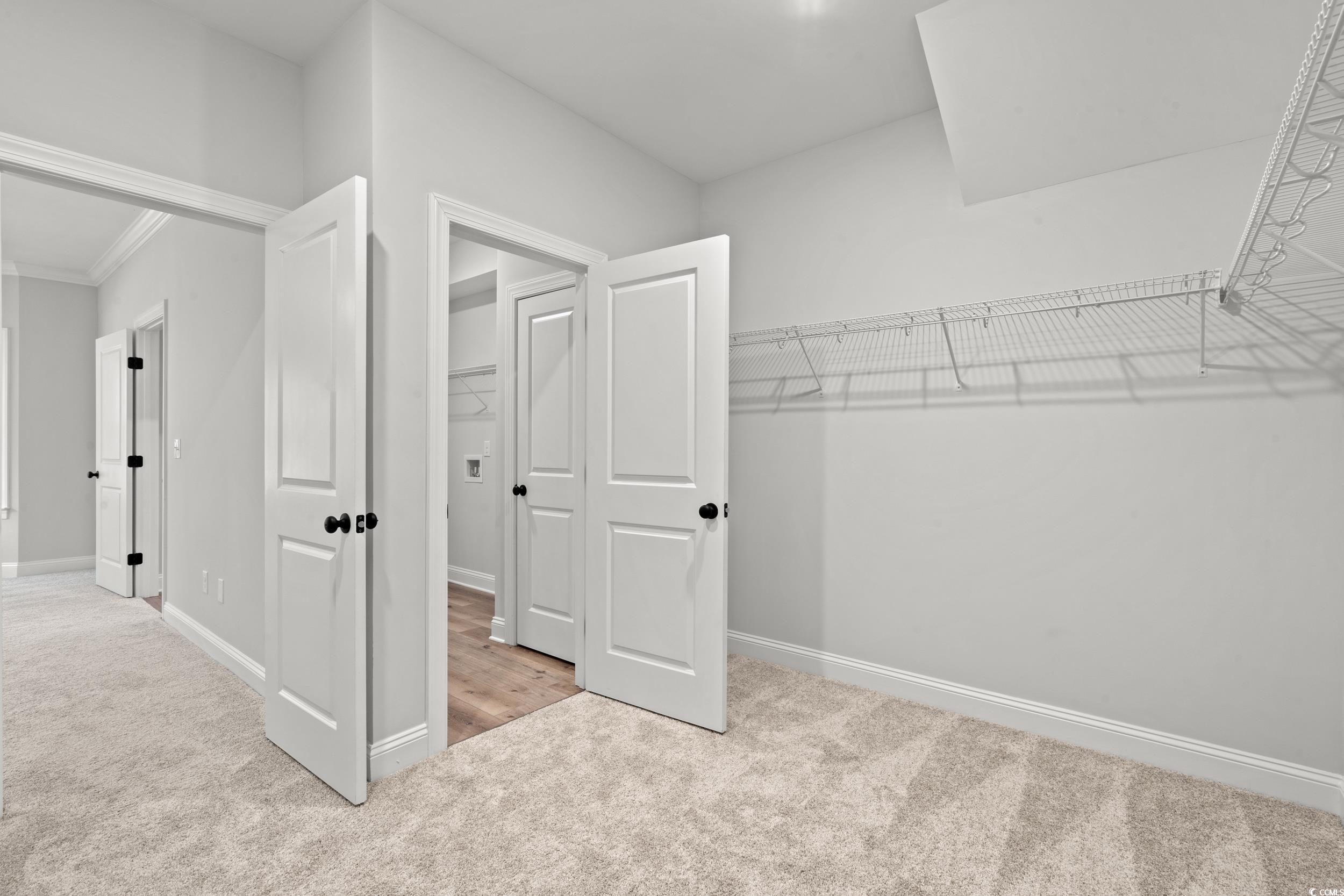 1201 Crooked Hook Road North Myrtle Beach, SC 29582 - Photo 14 of 23 Washroom featuring washer hookup, light wood finished floors, and hookup for an electric dryer