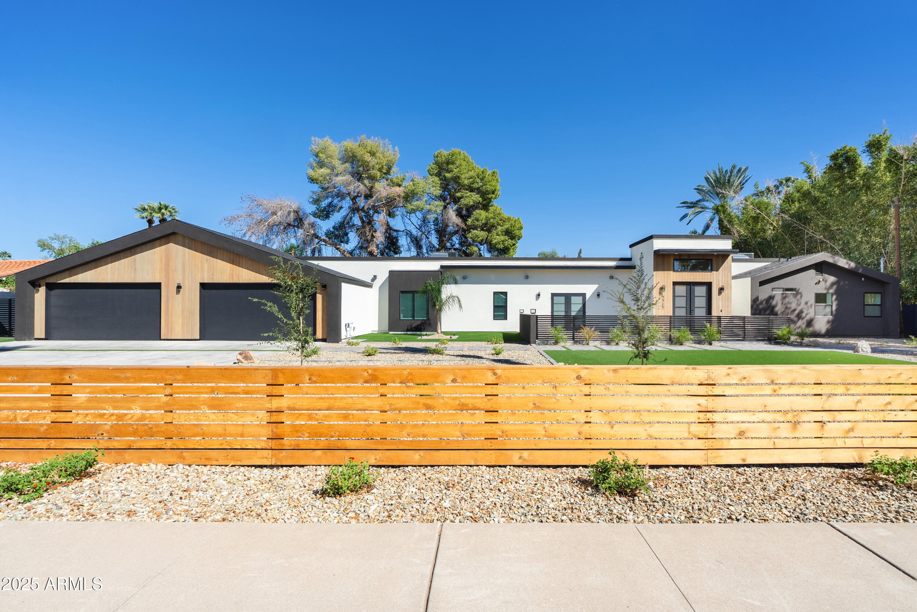 7717 North 7th Avenue Phoenix, AZ 85021 - Photo 1 of 26 a house view with a swimming pool