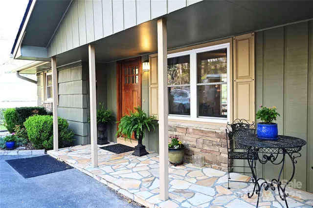 a view of a entryway door front of house