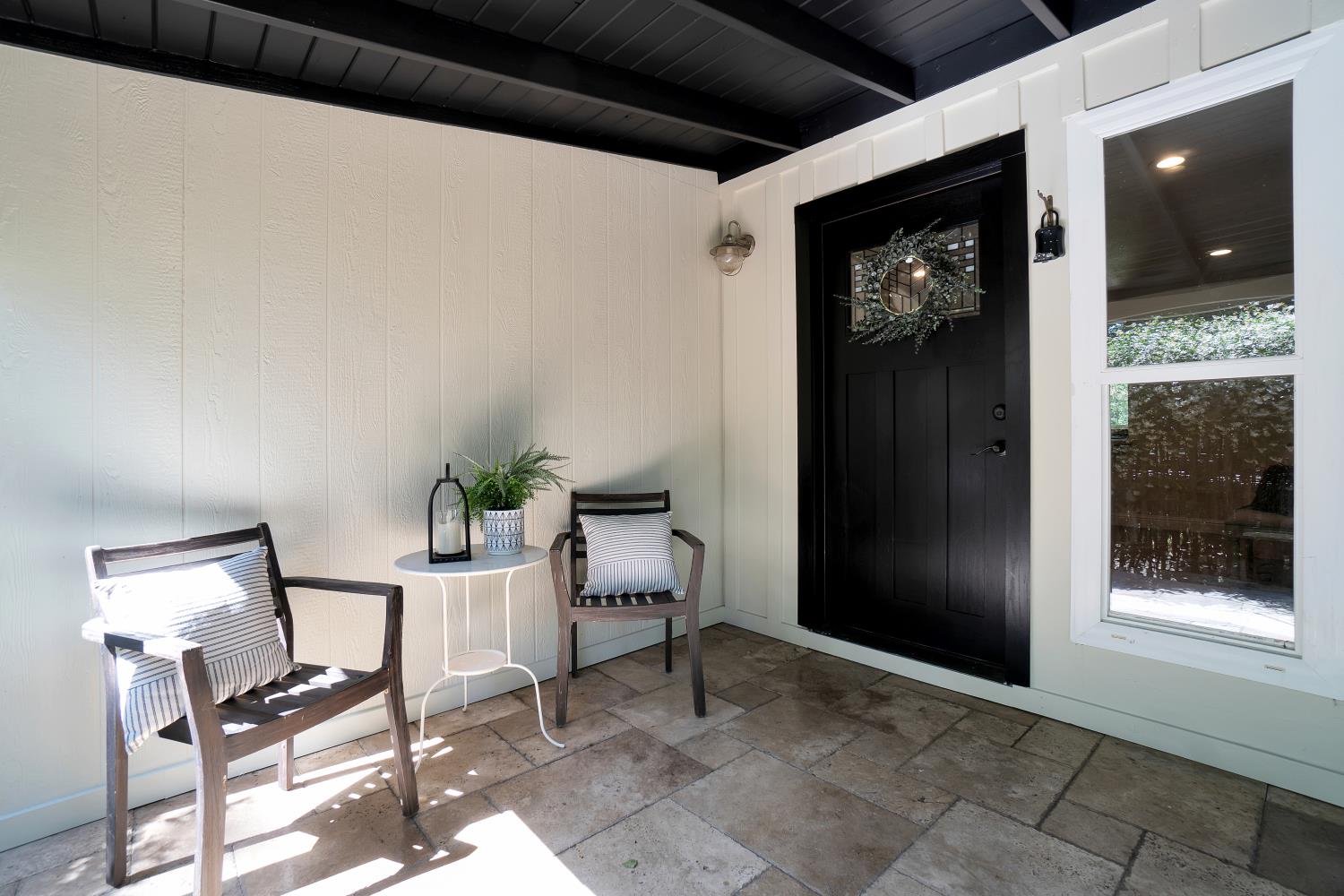 6299 Horseshoe Bar Road Loomis, CA 95650 - Photo 30 of 43 a living room with furniture and a flat screen tv