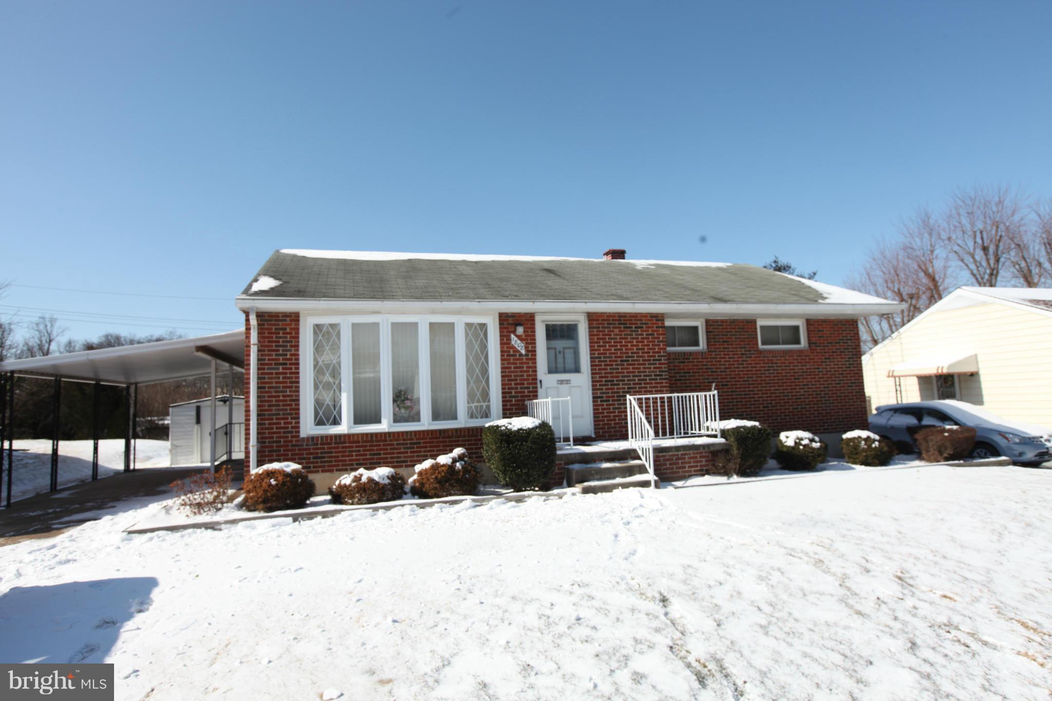 1808 Willann Road Baltimore, MD 21237 - Photo 1 of 23 a front view of a house with a yard