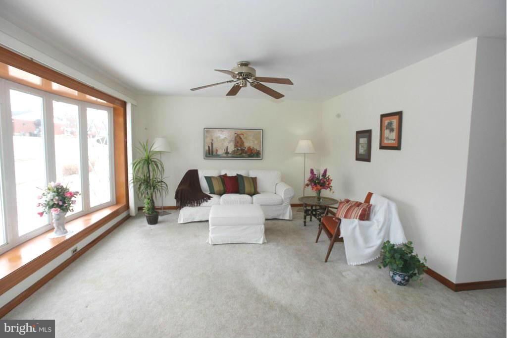 1808 Willann Road Baltimore, MD 21237 - Photo 2 of 23 a living room with furniture and a large window