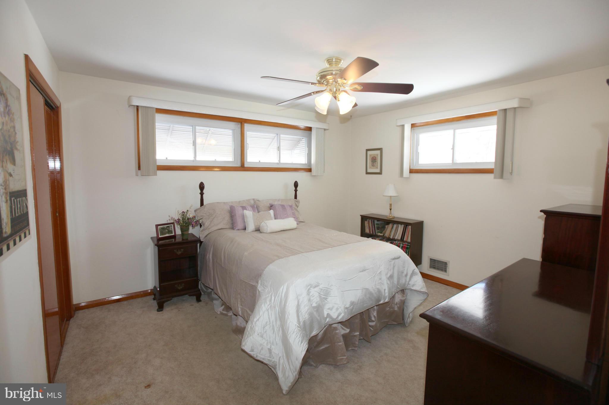 1808 Willann Road Baltimore, MD 21237 - Photo 12 of 23 a bedroom with a bed and a desk