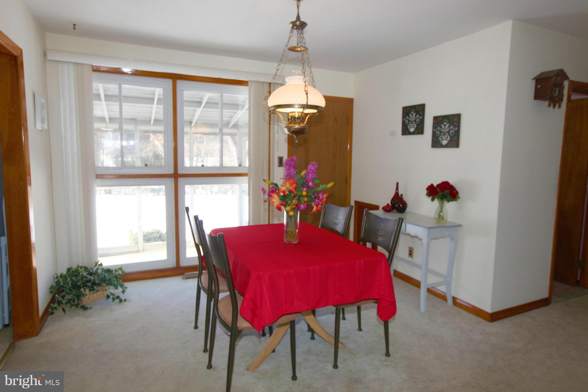 1808 Willann Road Baltimore, MD 21237 - Photo 6 of 23 a view of a dining room with furniture window and outside view