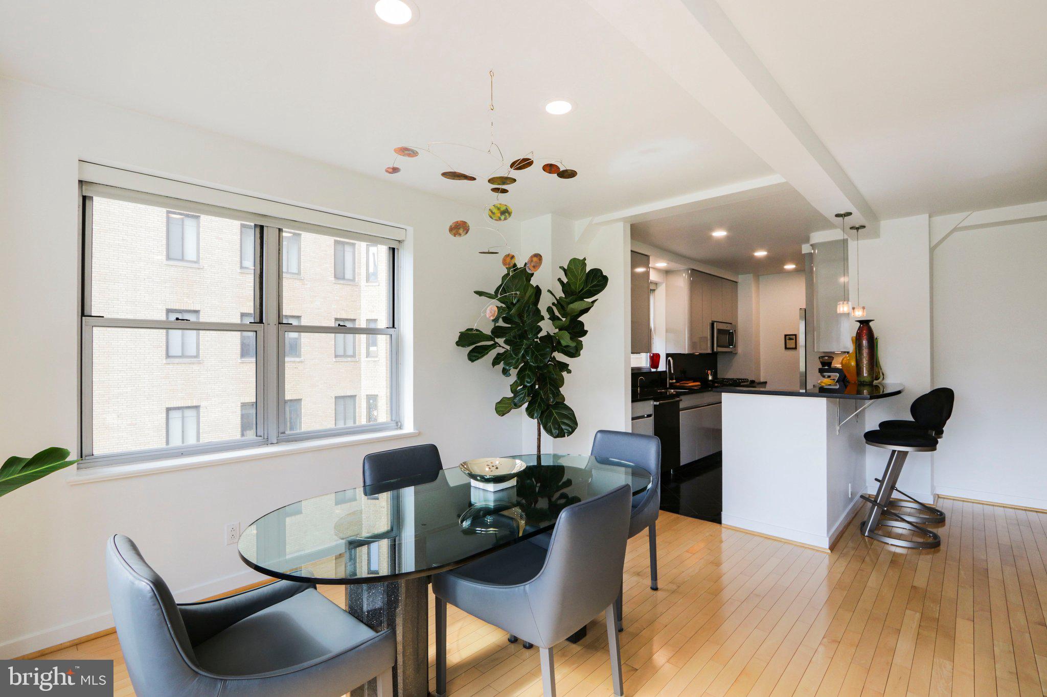 220 West Rittenhouse Square, Unit 10C Philadelphia, PA 19103 - Photo 16 of 39 a dining room with furniture and window