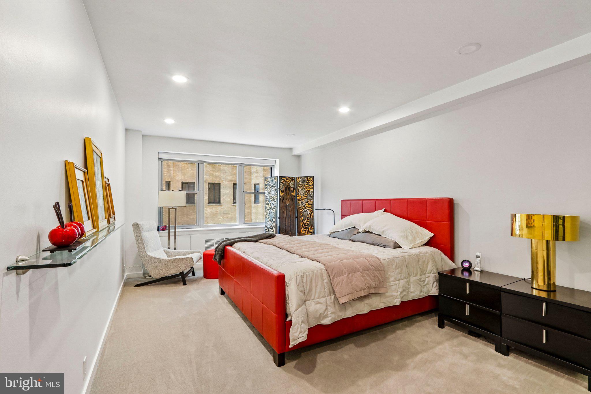 220 West Rittenhouse Square, Unit 10C Philadelphia, PA 19103 - Photo 22 of 39 a bedroom with a bed and dresser