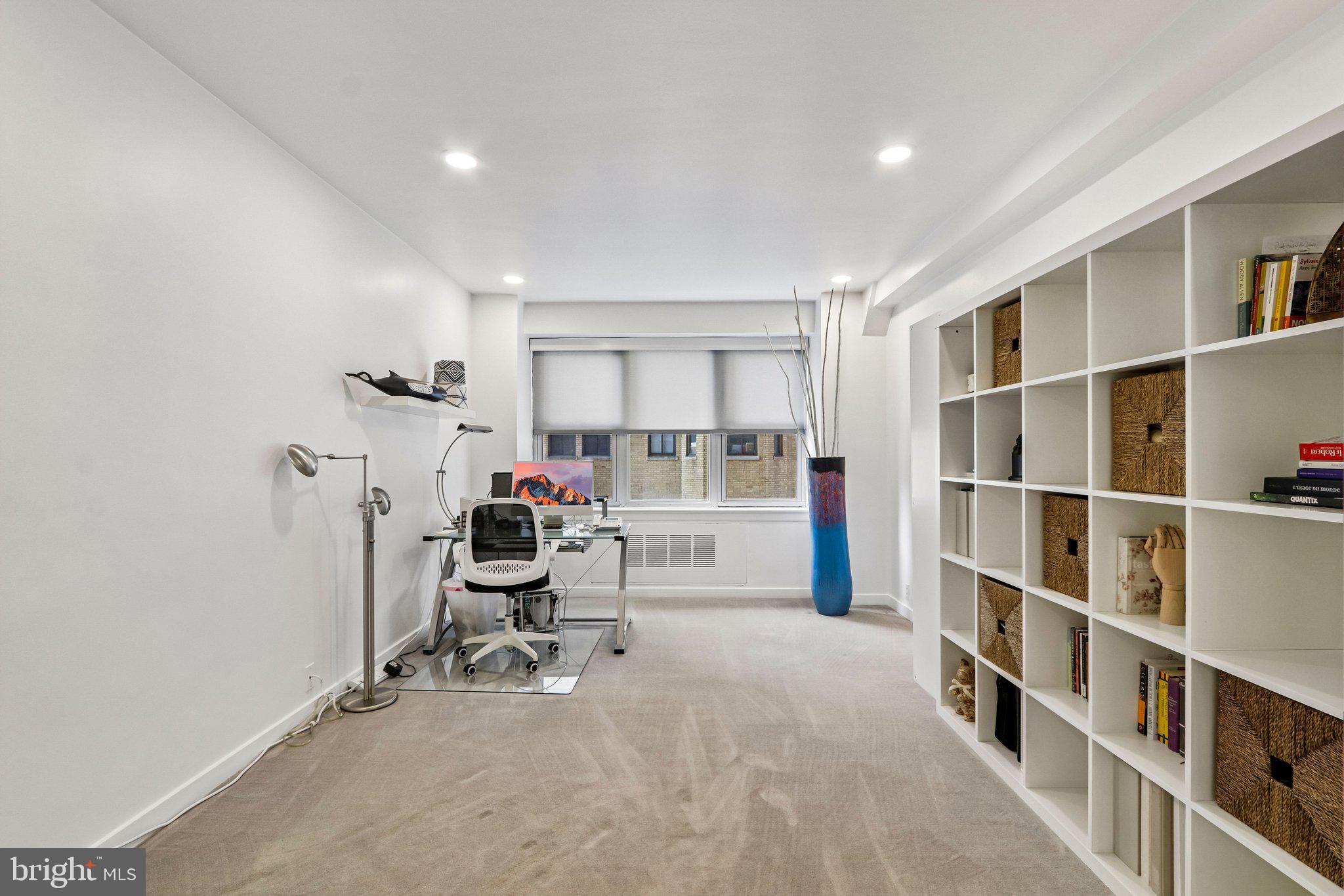220 West Rittenhouse Square, Unit 10C Philadelphia, PA 19103 - Photo 30 of 39 a room with furniture and gym equipment