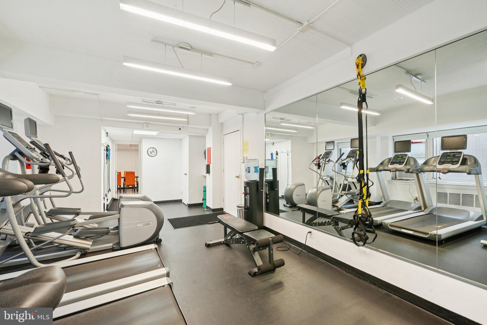 220 West Rittenhouse Square, Unit 10C Philadelphia, PA 19103 - Photo 34 of 39 a view of a room with gym equipment