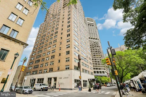 a view of a building with a street