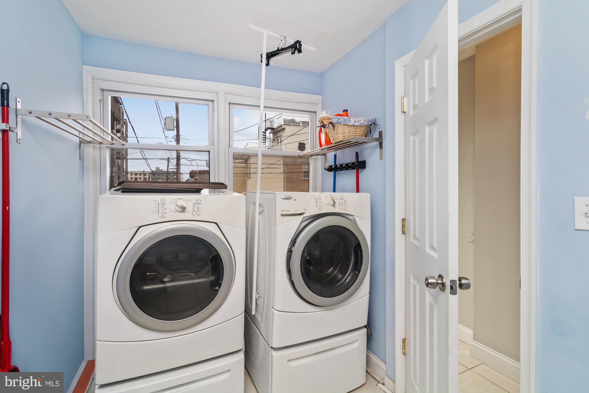 1812 Light Street Baltimore, MD 21230 - Photo 15 of 45 a utility room with dryer and washer
