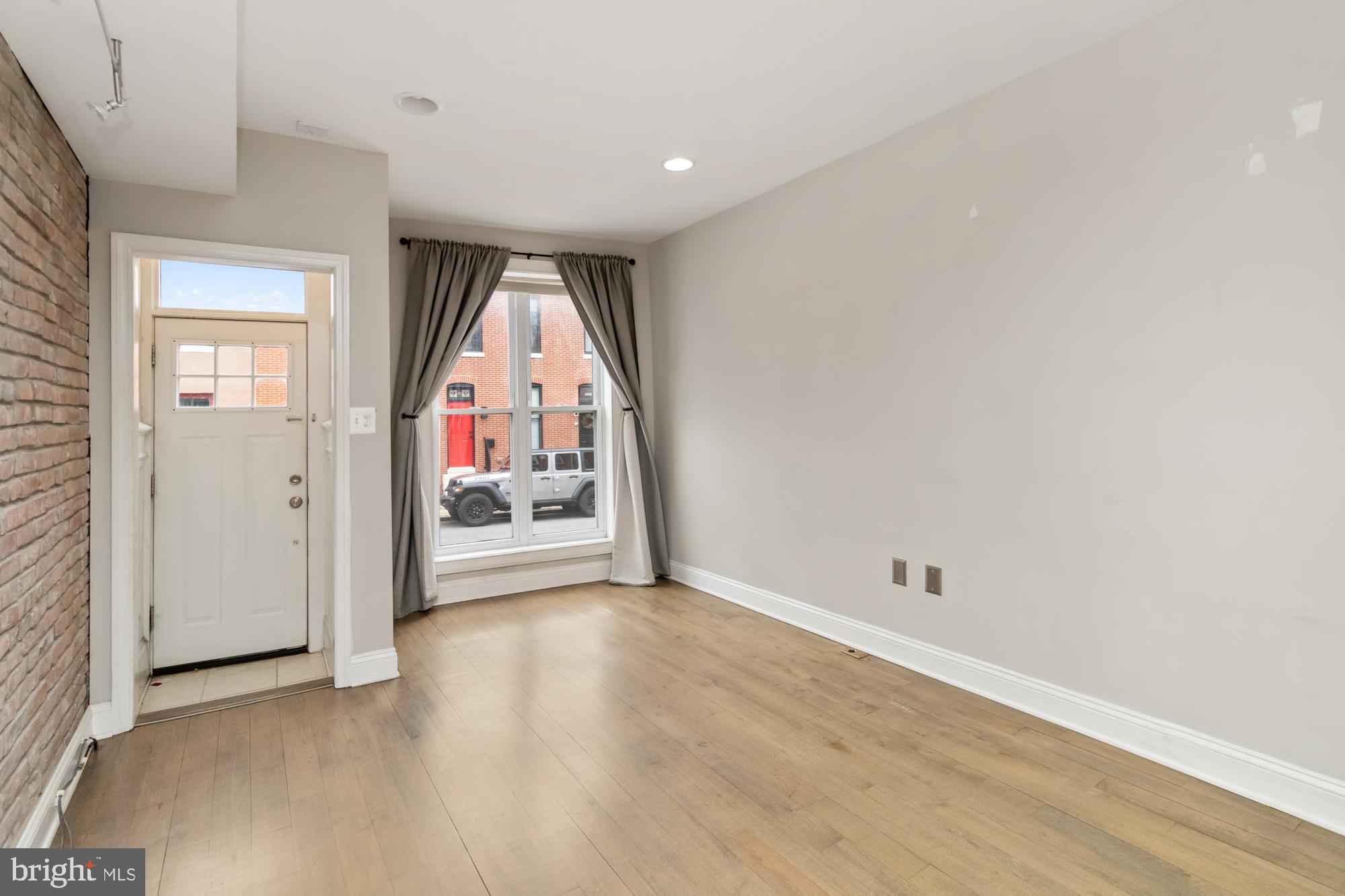 1812 Light Street Baltimore, MD 21230 - Photo 2 of 45 an empty room with entrance and windows