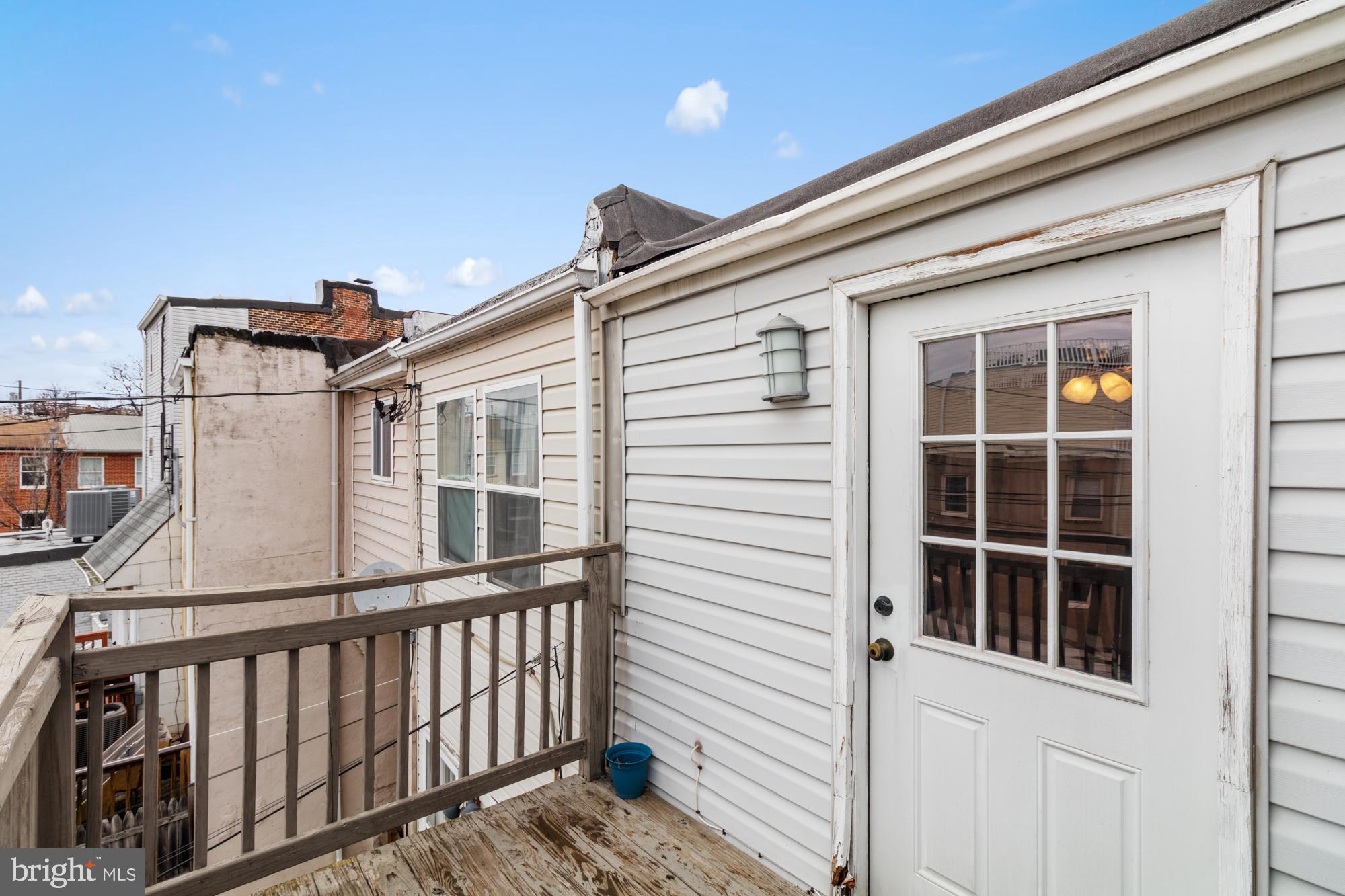 1812 Light Street Baltimore, MD 21230 - Photo 31 of 45 a view of a house with a window