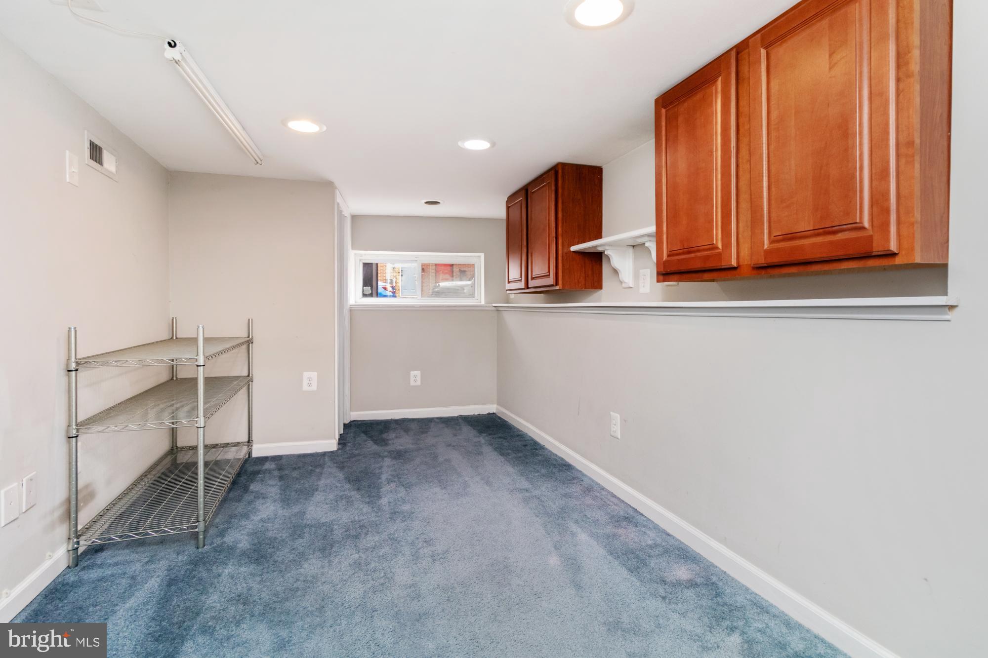 1812 Light Street Baltimore, MD 21230 - Photo 32 of 45 a view of cabinets and wooden floor
