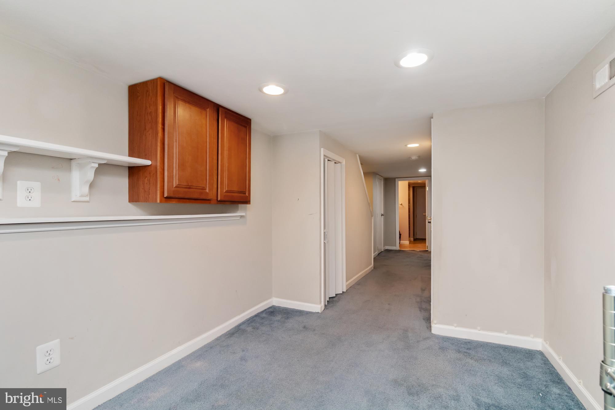 1812 Light Street Baltimore, MD 21230 - Photo 34 of 45 an entryway of a house and an empty room