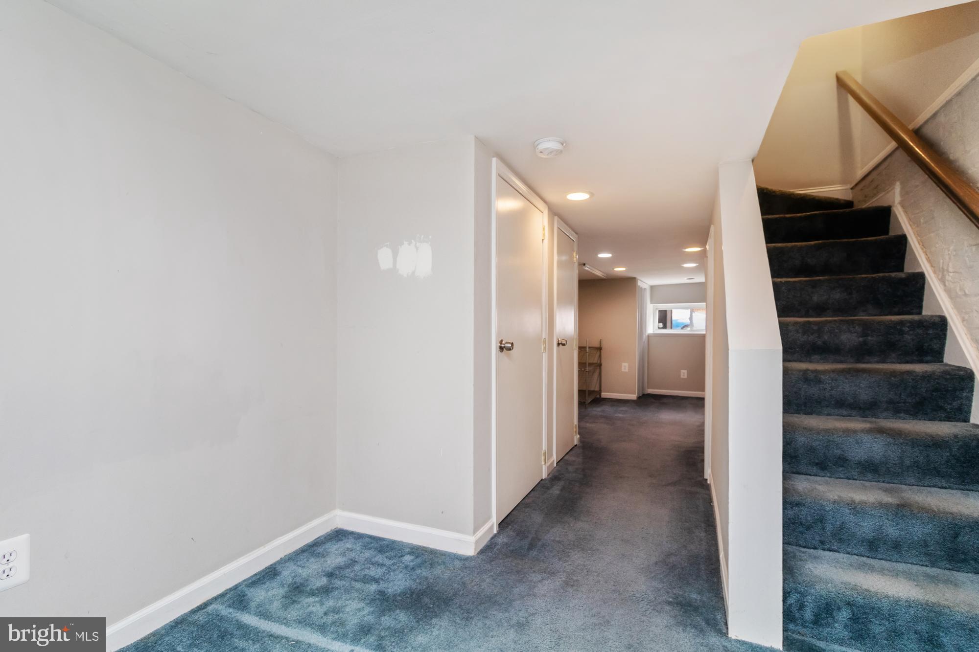 1812 Light Street Baltimore, MD 21230 - Photo 36 of 45 a view of a hallway with wooden shelves