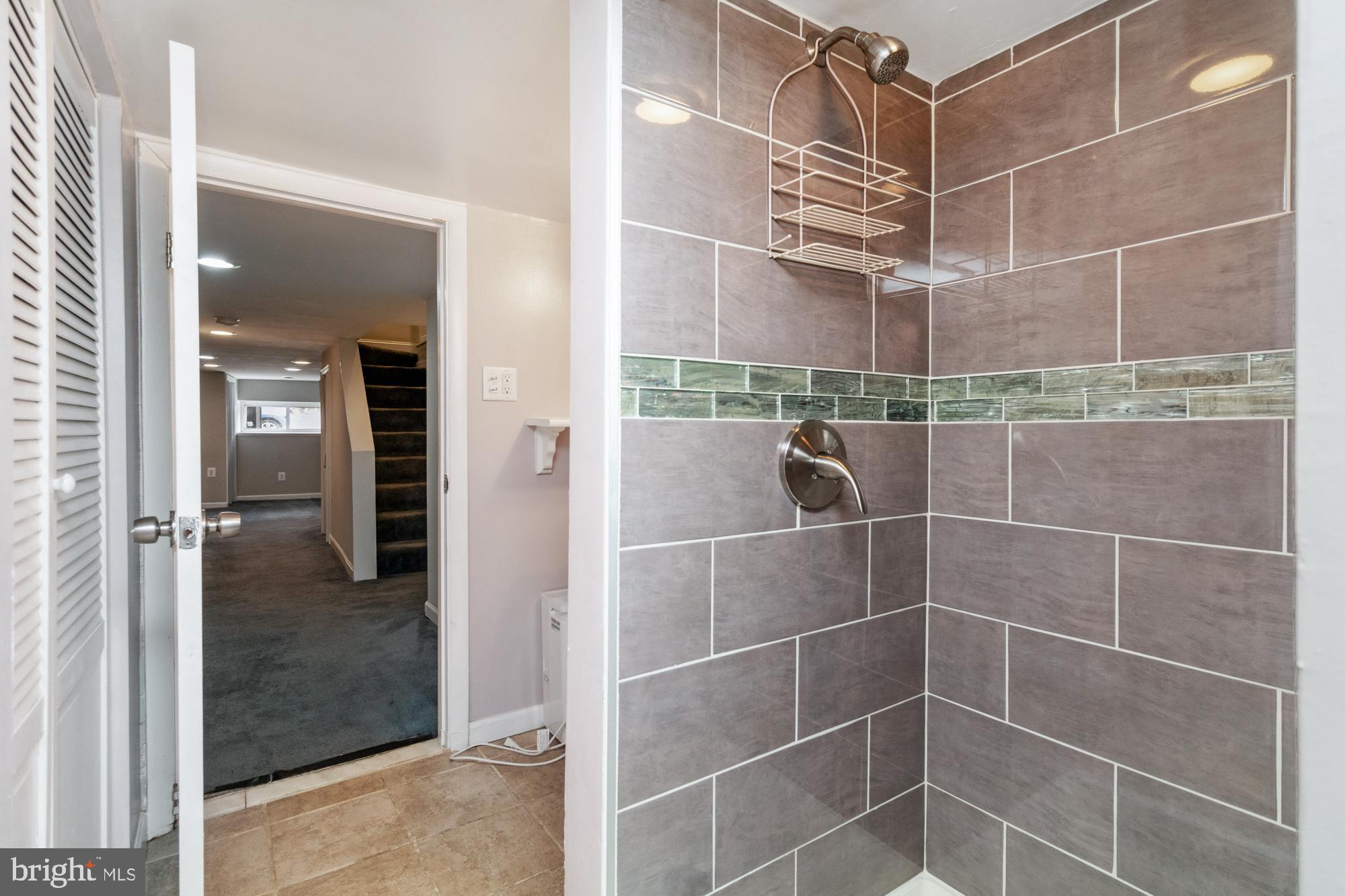 1812 Light Street Baltimore, MD 21230 - Photo 38 of 45 a bathroom with a glass shower