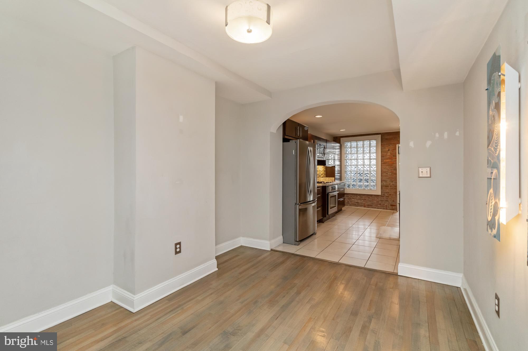 1812 Light Street Baltimore, MD 21230 - Photo 6 of 45 a view of a livingroom with wooden floor