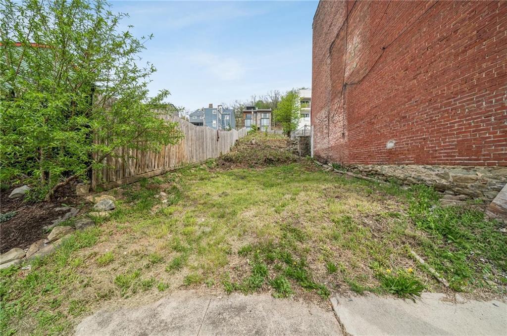 506 Armandale Street Pittsburgh, PA 15212 - Photo 2 of 9 a view of a yard with an trees