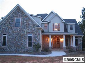 1204 Broadside Road York, SC 29745 - Photo 1 of 8 a front view of a house with garden