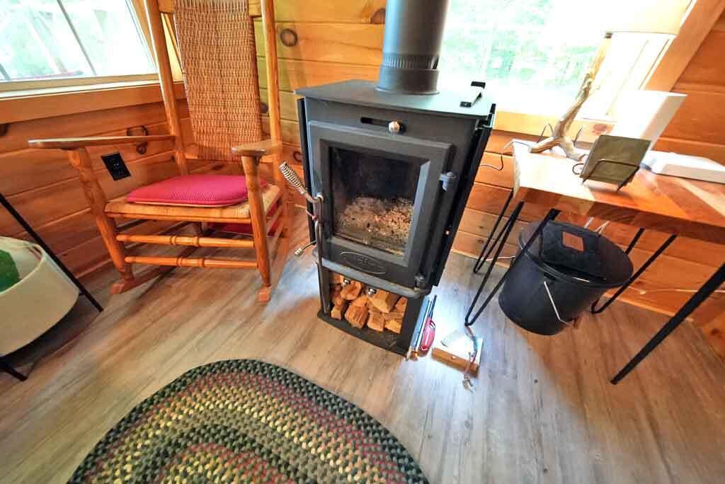 35 Sandy Beach Road Danforth, ME 04424 - Photo 18 of 53 wood-heater-lake-cabin
