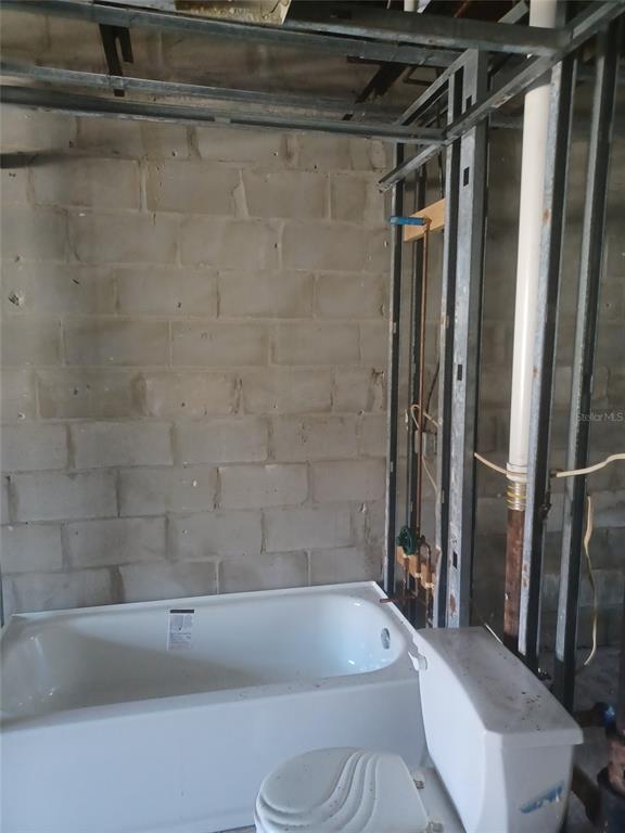 215 South McMullen Booth Road, Unit 181 Clearwater, FL 33759 - Photo 8 of 8 a bathroom with a bathtub and a shower