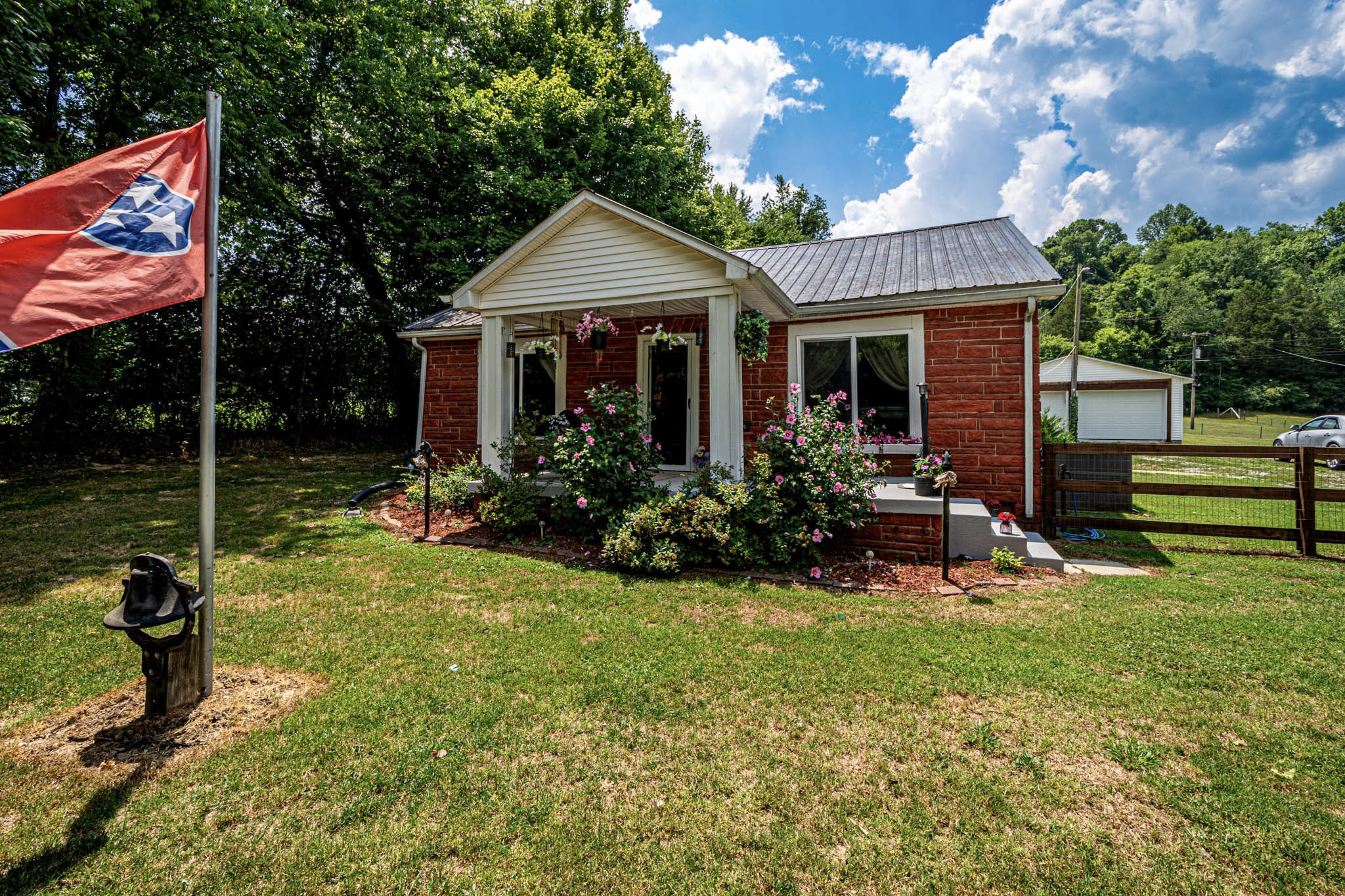 7091 Morgan Creek Road Centerville, TN 37033 - Photo 3 of 55 a view of a house with backyard porch and sitting area