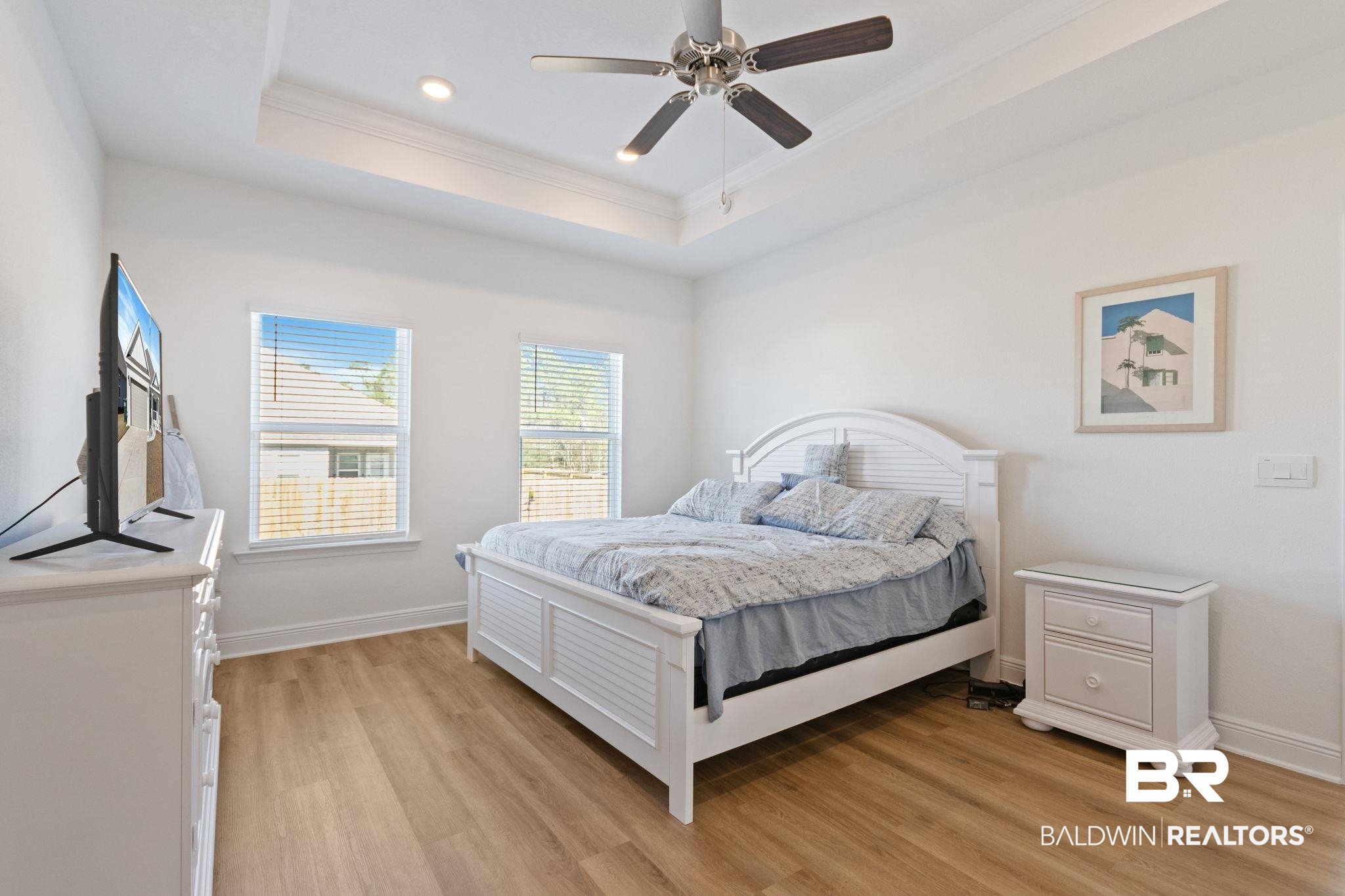 12919 Torrent Road Fairhope, AL 36532 - Photo 30 of 74 Bedroom featuring light wood-style floors, ornamental molding, and a ceiling fan