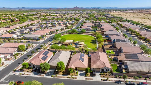 an aerial view of residential building and parking space