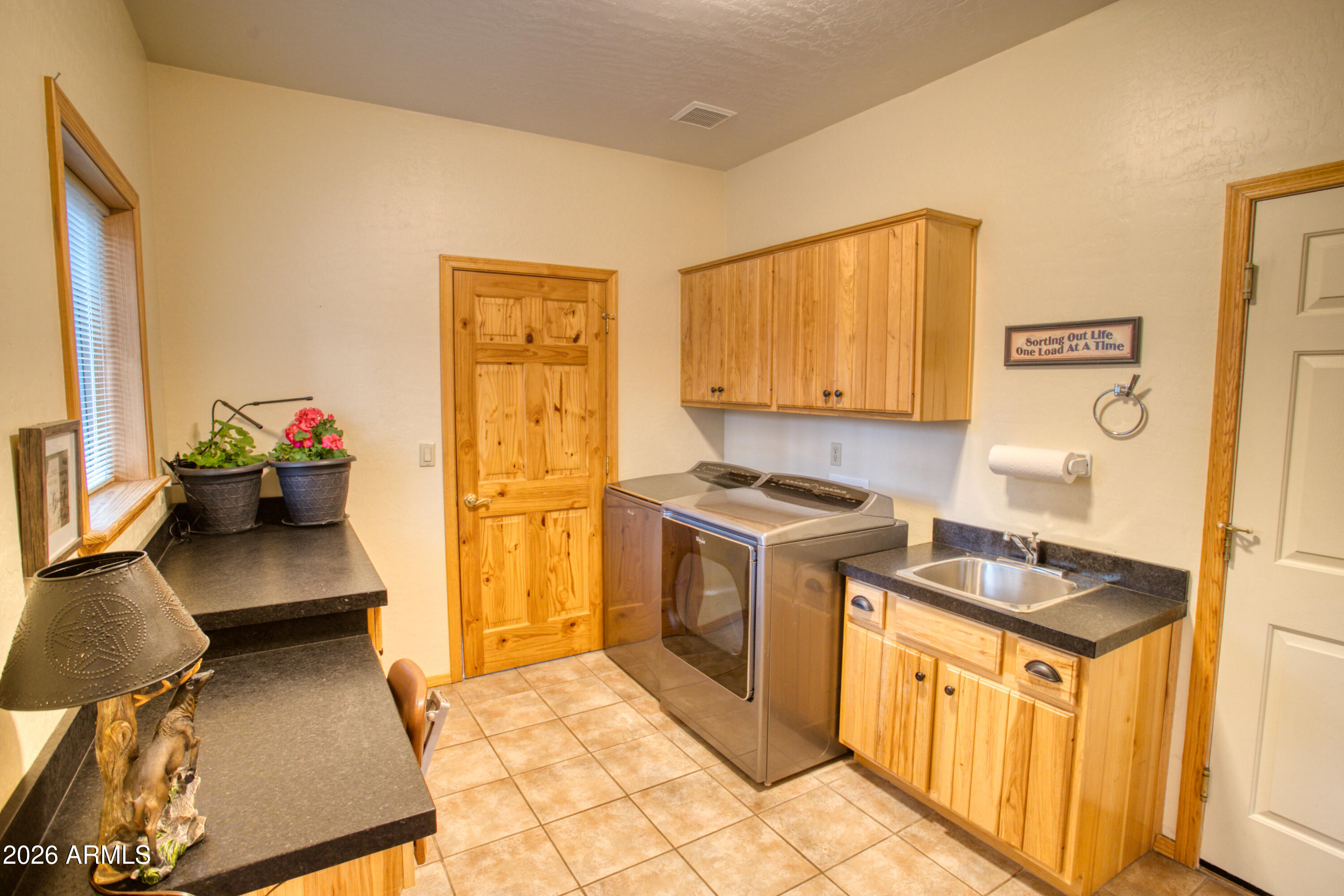 826 Pine Creek Circle Lakeside, AZ 85929 - Photo 21 of 68 a kitchen with stainless steel appliances granite countertop a stove a sink and a refrigerator
