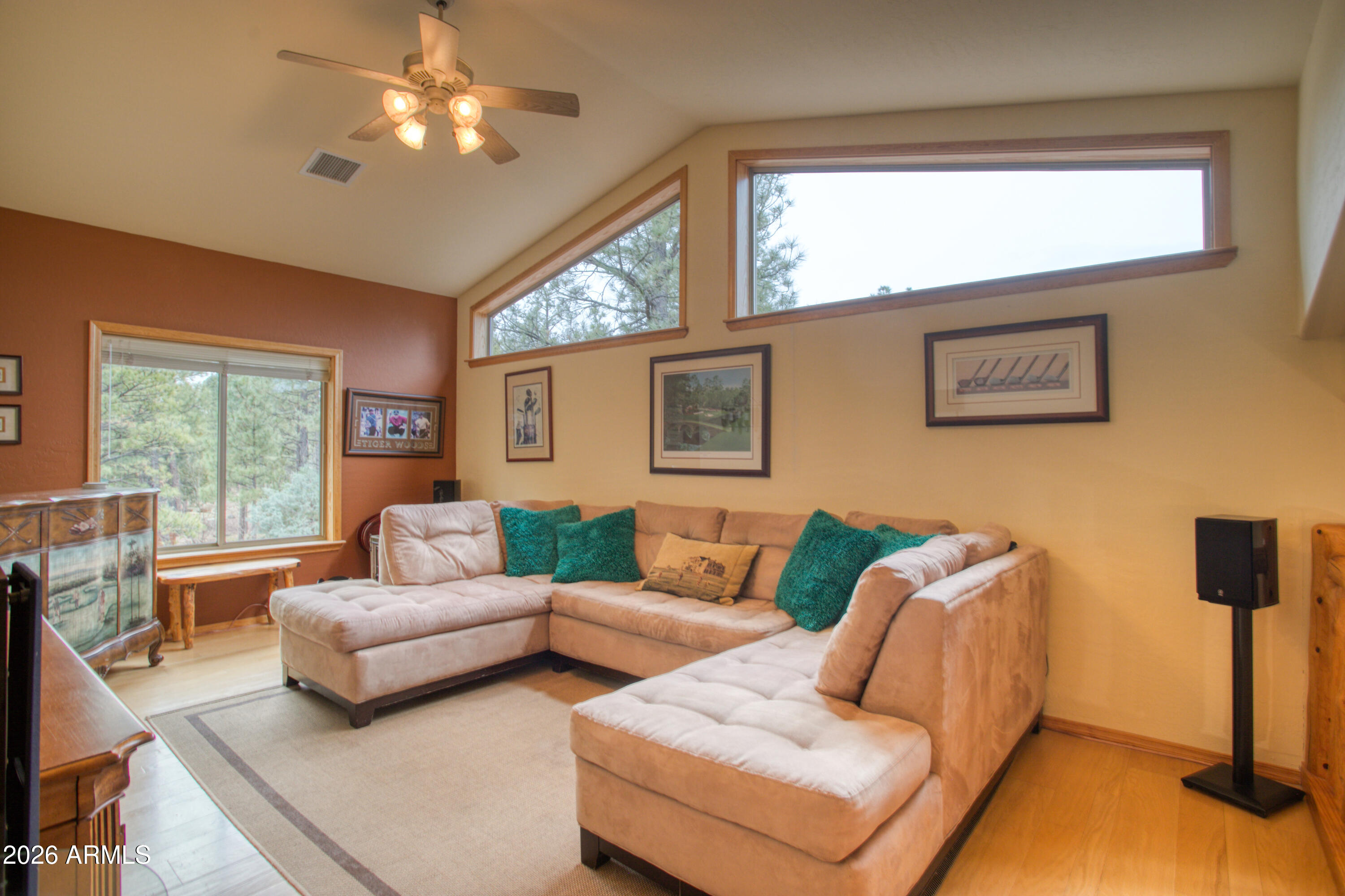 826 Pine Creek Circle Lakeside, AZ 85929 - Photo 27 of 68 a living room with furniture ceiling fan and a window