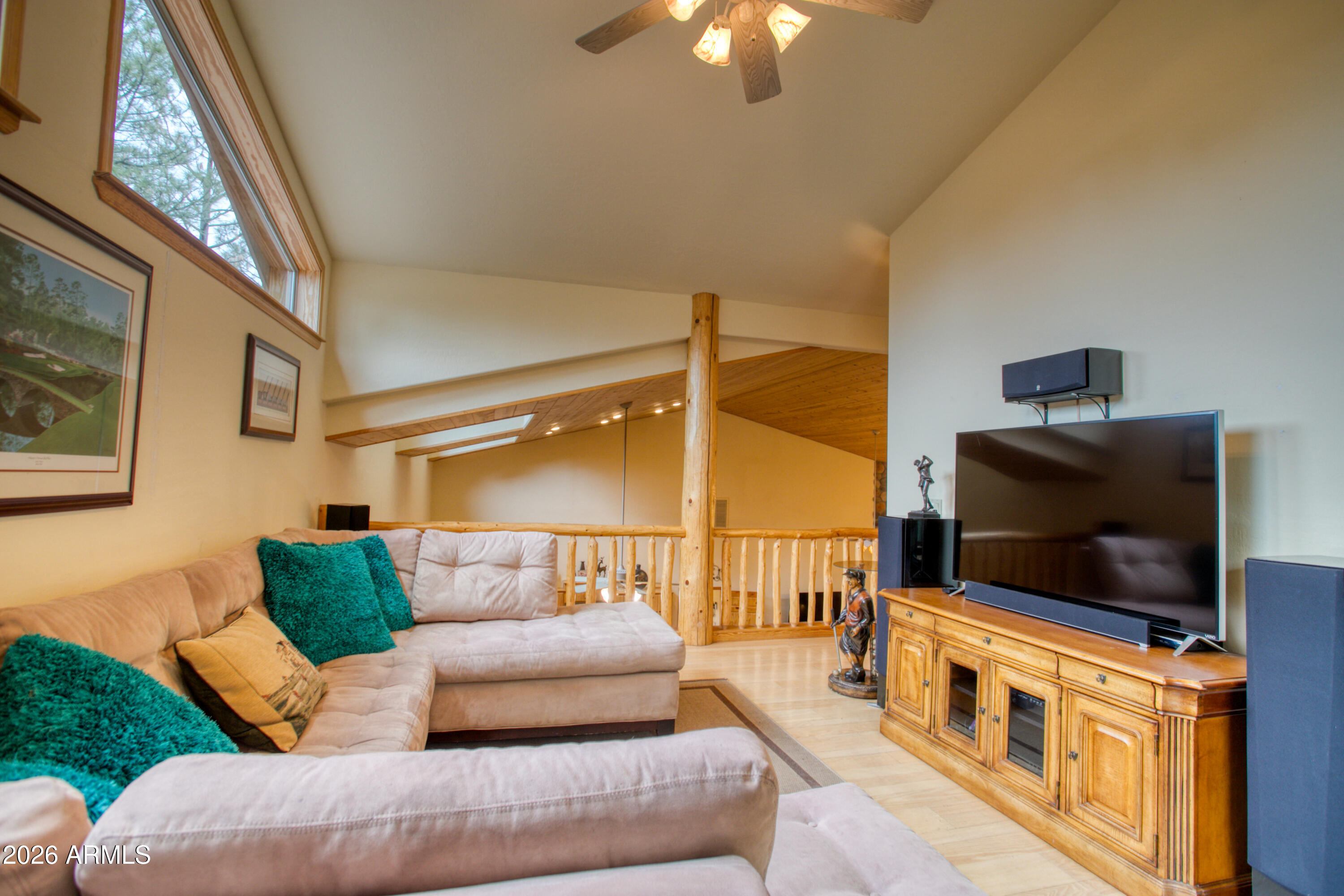 826 Pine Creek Circle Lakeside, AZ 85929 - Photo 28 of 68 a living room with furniture and a flat screen tv