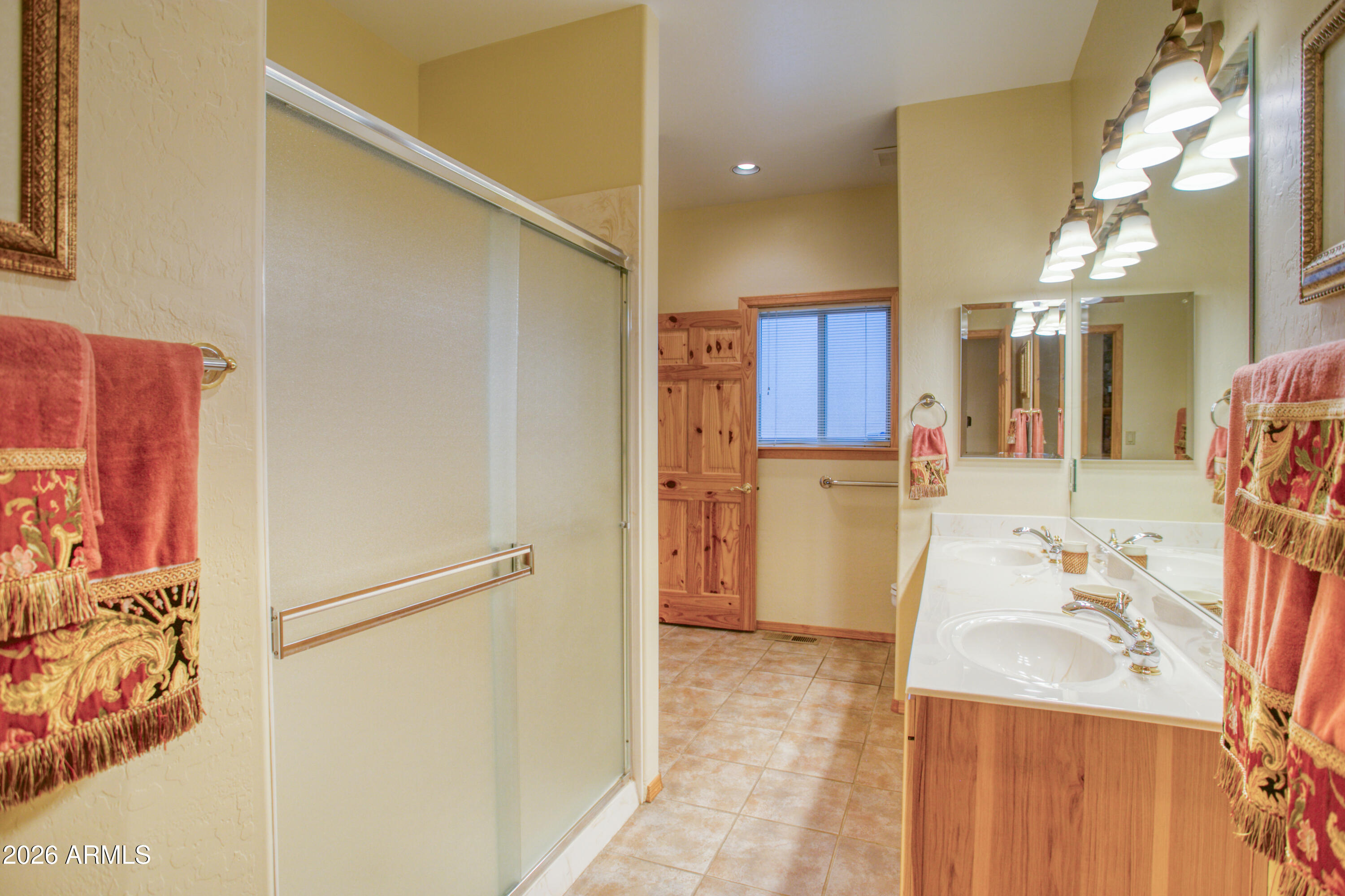 826 Pine Creek Circle Lakeside, AZ 85929 - Photo 31 of 68 a bathroom with a sink and a mirror