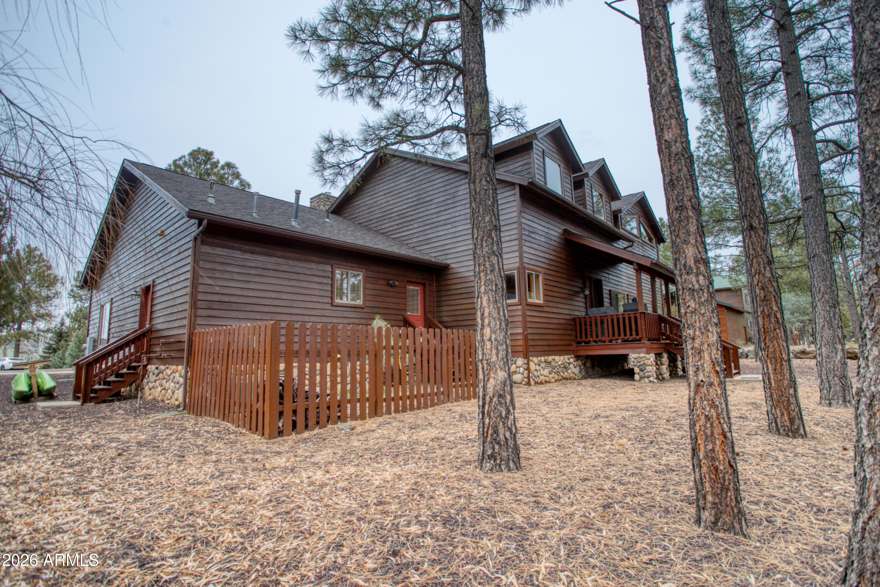 826 Pine Creek Circle Lakeside, AZ 85929 - Photo 34 of 68 a view of a house with a yard covered in snow