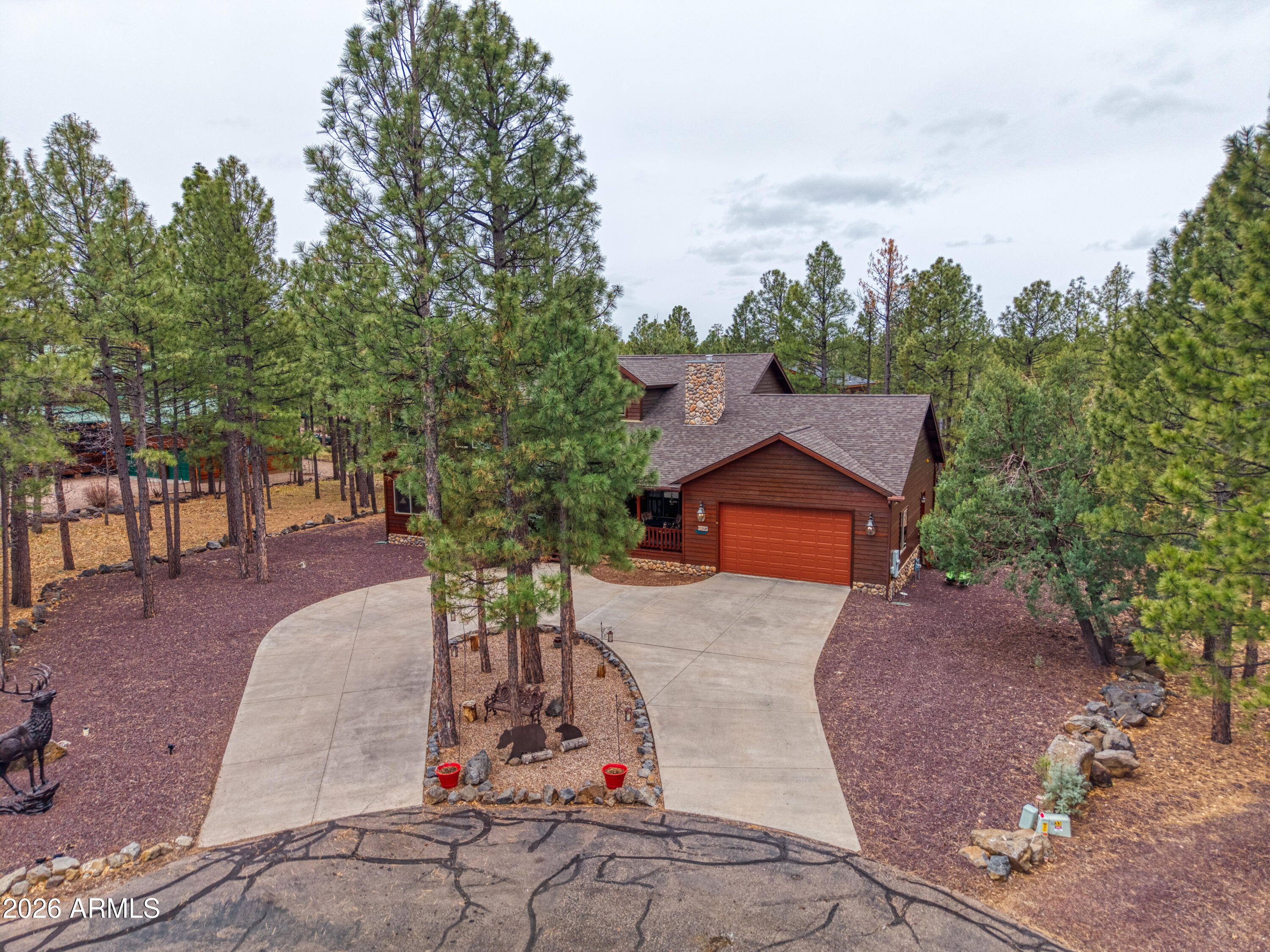 826 Pine Creek Circle Lakeside, AZ 85929 - Photo 39 of 68 an aerial view of a house with garden