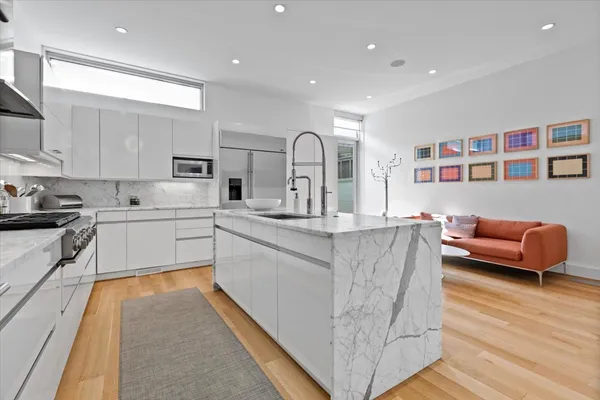 a bedroom with a bed and a table